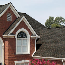 Hip and ridge cap shingles on beautiful home