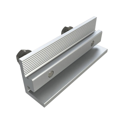 The Unirac Bonding Splice Bar Pro by Solartek is a silver metal bracket with a grooved top and two black screw hole fittings. It features a rectangular base and vertical support, designed for mounting or supporting structures, ensuring streamlined installation and broad compatibility.