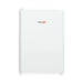 A sleek, rectangular white device with rounded corners featuring a discreet SolarEdge logo in black and red text. Ideal for energy storage as the SolarEdge Energy Bank Battery 10kW (Model BAT-10K1PS0B-02), it seamlessly blends into its plain white background while providing reliable backup power.